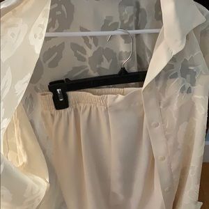 Two pieces suit with pants and button down shirt